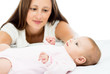 Photo: happy mother looking at her baby infant happy mother looking at her baby infant