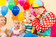 Photo: happy kid boy and clown on birthday party happy kid boy and clown on birthday party