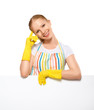 happy young housewife in glove with white empty billboard isolat