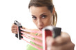 woman doing fitness exercise with rubber band