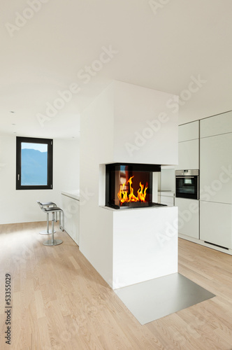 Photo: interior new house, modern kitchen with fireplace interior new house, modern kitchen with fireplace