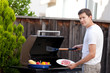 Photo: man grilling food man grilling food