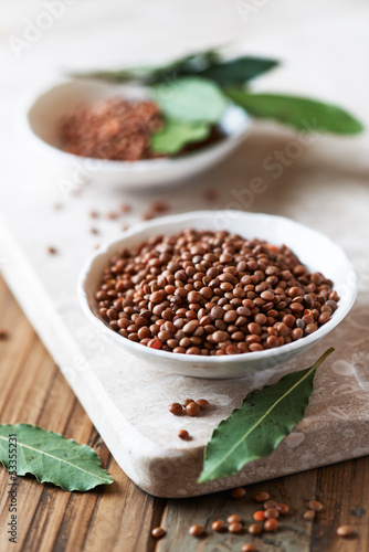 Photo: Brown lentils and fresh bay leaves Brown lentils and fresh bay leaves