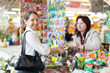 Photo: cheerful mature woman buys seeds cheerful mature woman buys seeds
