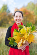 mature woman with maple posy