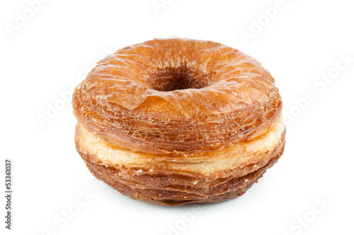 Photo: Croissant and doughnut mixture isolated on white Croissant and doughnut mixture isolated on white
