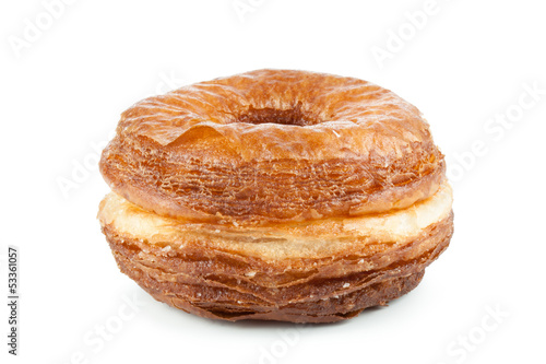 Photo: Croissant and doughnut mixture isolated on white Croissant and doughnut mixture isolated on white