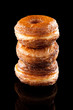 Croissant and doughnut mixture pile isolated on black