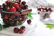 Foto: Ripe cherries in a metal basket Ripe cherries in a metal basket