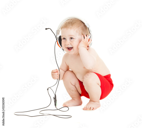 Photo: baby with headphone. young DJ baby with headphone. young DJ