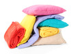 Bright pillows and plaids, isolated on white