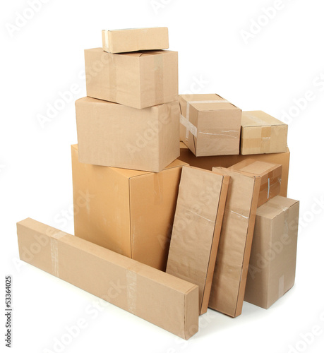 Photo: Different cardboard boxes isolated on white Different cardboard boxes isolated on white