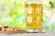 Beer in glass crunches, and nuts