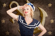 Photo: Retro pin-up sailor woman. Retro 50s fashion style Retro pin-up sailor woman. Retro 50s fashion style