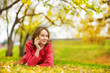 A portrait of a smiling beautiful woman talking on the phone