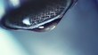 dropping faucet close-up slowmotion
