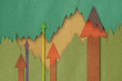 Business charts with growth arrow