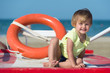 happy little girl at the seaside in summer
