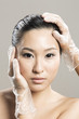 Chinese woman receiving Beauty Treatment.