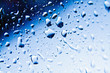 Raindrops on blue glass