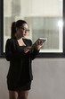 Photo: Asian businesswoman reading a tablet computer Asian businesswoman reading a tablet computer