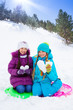 Photo: Two girls with snow hearts Two girls with snow hearts