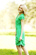 Happy woman in park