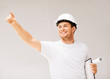 Foto: male architect looking at blueprint male architect looking at blueprint