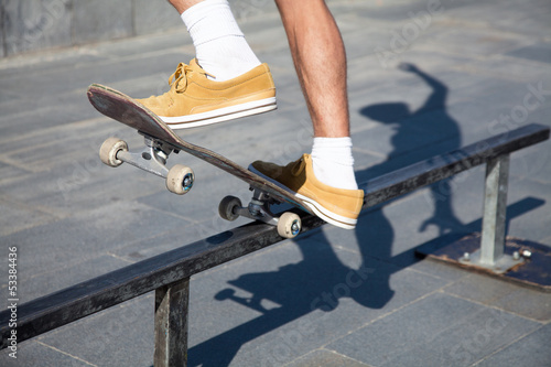 Photo: Skateboarders Feet Close Up Skateboarders Feet Close Up