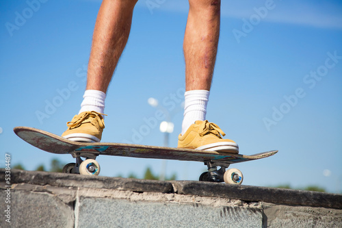 Photo: Skateboarders Feet Close Up Skateboarders Feet Close Up