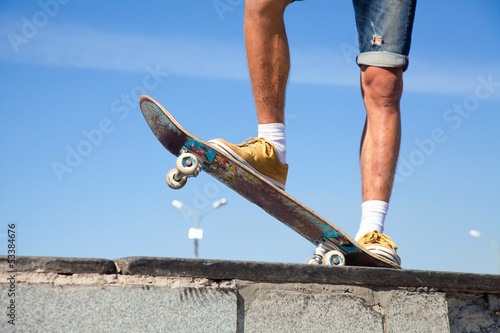Photo: Skateboarders Feet Close Up Skateboarders Feet Close Up