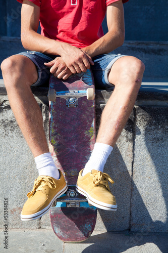 Photo: unrecognizable skateboarder unrecognizable skateboarder