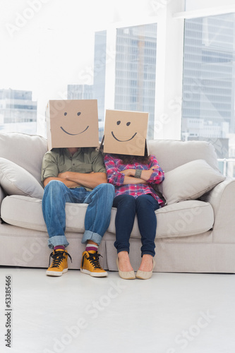 Photo: Funny workers wearing boxes on their heads Funny workers wearing boxes on their heads