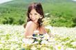 Photo: girl in the field with camomiles girl in the field with camomiles