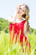 Photo: beautiful blonde girl in green field beautiful blonde girl in green field