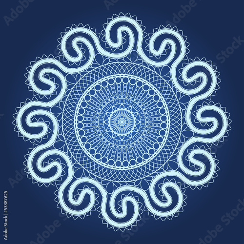 Vector: Ornamental round lace on blue background. Ornamental round lace on blue background.
