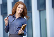 Young happy women or student on the property business background