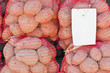 Potato Sacks with Blank Price Tag on Farmers Market