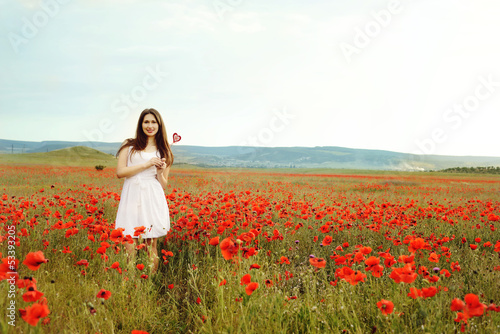Photo: teen girl in poppy field teen girl in poppy field