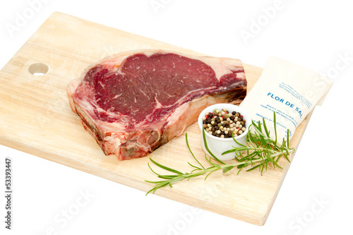 Photo: Raw dry aged t-bone steak Raw dry aged t-bone steak