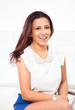 Foto: Beautiful young woman posing in studio. Beautiful young woman posing in studio.