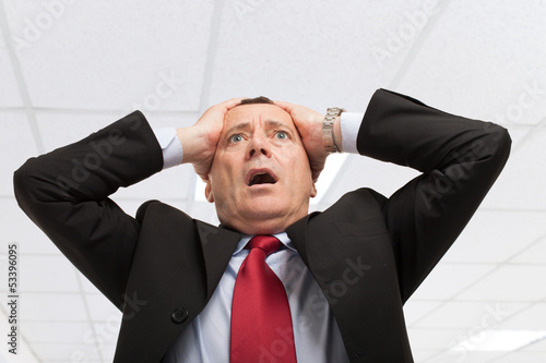 Photo: Desperate businessman Desperate businessman
