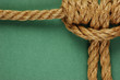 Rope with marine knot  on the green background