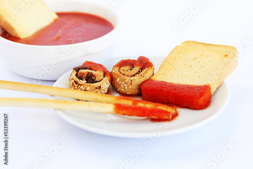 Photo: Rusks with sesame seeds, bread sticks and sauce Rusks with sesame seeds, bread sticks and sauce