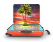 Open suitcase with tropical island at evening