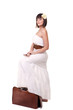 Beautiful girl with suitcase
