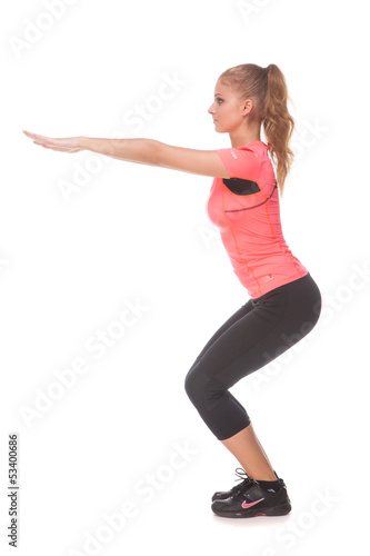 Photo: Girl doing sport exercise Girl doing sport exercise