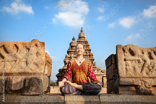 Photo: Woman doing yoga in India Woman doing yoga in India