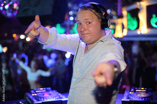 Photo: DJ in a club with a trace of lipstick on his face DJ in a club with a trace of lipstick on his face