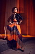 sexy stylish model in evening dress in vogue style outdoors